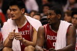 LOS ANGELES, CA - NOVEMBER 07:  Yao Ming #11 and Ron Artest #96 of the Houston Rockets sit on the bench during the game with the Los Angeles Clippers on November 7, 2008 at Staples Center in Los Angeles, California.  The Rockets won 92-83.  NOTE TO USER: User expressly acknowledges and agrees that, by downloading and/or using this Photograph, user is consenting to the terms and conditions of the Getty Images License Agreement.  (Photo by Stephen Dunn/Getty Images)