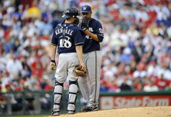 PHILADELPHIA - OCTOBER 01:  Yovani Gallardo #49 and Jason Kendall #18 of the Milwaukee Brewers confer on the mound in Game 1 of the NLDS Playoff against of the Philadelphia Phillies at Citizens Bank Ballpark on October 1, 2008 in Philadelphia, Pennsylvania  (Photo by Jeff Zelevansky/Getty Images)