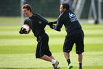 MANCHESTER, UNITED KINGDOM - MARCH 11:  Robinho of Manchester City jokes around with team mate Elano during a training session, ahead of their UEFA Cup match against Aalborg, held at the Carrington Training Complex on March 11, 2009 in Manchester, England.  (Photo by Alex Livesey/Getty Images)