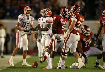 MIAMI - JANUARY 08:  Percy Harvin #1 of the Florida Gators reacts after he got a first down against the Oklahoma Sooners during the FedEx BCS National Championship game at Dolphin Stadium on January 8, 2009 in Miami, Florida.  (Photo by Doug Benc/Getty Images)