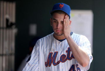 NEW YORK - APRIL 26:  Oliver Perez #46 of the New York Mets reacts in the dugout after he was taken out of their game against the Washington Nationals in the fifth inning on April 26, 2009 at Citi Field in the Flushing neighborhood of the Queens borough of New York City.  (Photo by Ezra Shaw/Getty Images)