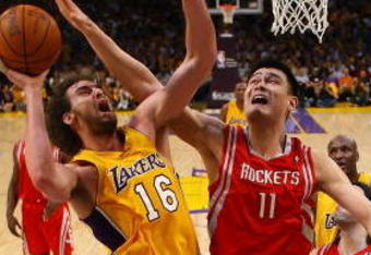 LOS ANGELES, CA - MAY 04:  Pau Gasol #16 of the Los Angeles Lakers goes up for a shot against Yao Ming #11 of the Houston Rockets in Game One of the Western Conference Semifinals during the 2009 NBA Playoffs at Staples Center on May 4, 2009 in Los Angeles, California. NOTE TO USER: User expressly acknowledges and agrees that, by downloading and or using this photograph, User is consenting to the terms and conditions of the Getty Images License Agreement.  (Photo by Jeff Gross/Getty Images)