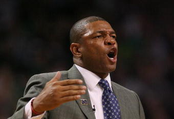 BOSTON - MAY 04:  Head coach Doc Rivers of the Boston Celtics reacts to a foul called against his team in the second half against the Orlando Magic in Game One of the Eastern Conference Semifinals during the 2009 NBA Playoffs at TD Banknorth Garden on May 4, 2009 in Boston, Massachusetts. The Magic defeated the Celtics 95-90. NOTE TO USER: User expressly acknowledges and agrees that, by downloading and or using this photograph, User is consenting to the terms and conditions of the Getty Images License Agreement.  (Photo by Elsa/Getty Images)