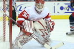 COLUMBUS, OHIO - APRIL 23:  Chris Osgood #30 of the Detroit Red Wings keeps an eye on the play against the Columbus Blue Jackets during Game Four of the Western Conference Quarterfinals of the 2009 Stanley Cup Playoffs on April 23, 2009 at the Nationwide Arena in Columbus, Ohio. The Red Wings defeated the Blue Jackets 6-5 on a late goal by Johan Franzen to eliminate the Blue Jackets 4 games to 0. (Photo by Claus Andersen/Getty Images