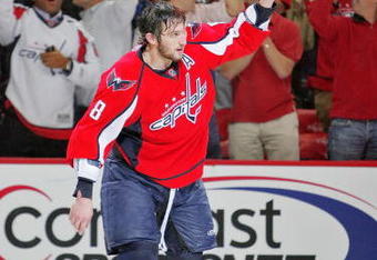 WASHINGTON - MAY 04:  Alex Ovechkin #8 of the Washington Capitals celebrates being named the first star of the game against the Pittsburgh Penguins during Game Two of the Eastern Conference Semifinal Round of the 2009 Stanley Cup Playoffs on May 4, 2009 at the Verizon Center in Washington,  DC.  (Photo by Len Redkoles/Getty Images)