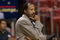 MIAMI - OCTOBER 18:  Head coach Mike Woodson of the Atlanta Hawks watches the preseason game against the Miami Heat at American Airlines Arena on October 18, 2004 in Miami, Florida.  The Heat won 92-82.  NOTE TO USER: User expressly acknowledges and agrees that, by downloading and/or using this Photograph, user is consenting to the terms and conditions of the Getty Images License Agreement. Mandatory Copyright Notice: Copyright 2004 NBAE (Photo by Eliot J. Schechter/Getty Images)