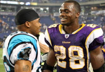 MINNEAPOLIS - SEPTEMBER 21:  Running back Adrian Peterson #28 of the Minnesota Vikings talks with wide receiver Steve Smith of the Carolina Panthers after the game at the HH Humphrey Metrodome on September 21, 2008 in Minneapolis, Minnesota.  The Vikings defeated the Panthers 20-10.  (Photo by David Sherman/Getty Images)