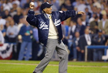 BRONX, NY - OCTOBER 9:  Yankee great Phil Rizzuto throws out the game's first pitch to former teammate Yogi Berra during game 2 of the American League Championship Series between the New York Yankees and Boston Red Sox on October 9, 2003 at Yankee Stadium in the Bronx, New York.  (Photo by Al Bello/Getty Images)