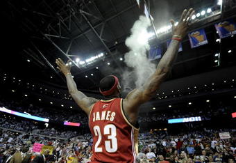 AUBURN HILLS, MI - APRIL 26:  LeBron James #23 of the Cleveland Cavaliers does his pre game ritual prior to playing the Detroit Pistons in Game Four of the Eastern Conference Quarterfinals during the 2009 NBA Playoffs at the Palace of Auburn Hills on April 26, 2009 in Auburn Hills, Michigan. NOTE TO USER: User expressly acknowledges and agrees that, by downloading and or using this photograph, User is consenting to the terms and conditions of the Getty Images License Agreement.  (Photo by Gregory Shamus/Getty Images)