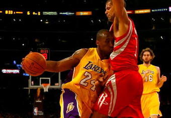 LOS ANGELES, CA - MAY 04:  Kobe Bryant #24 of the Los Angeles Lakers drives into Shane Battier #31 of the Houston Rockets in the first quarter of Game One of the Western Conference Semifinals during the 2009 NBA Playoffs at Staples Center on May 4, 2009 in Los Angeles, California. NOTE TO USER: User expressly acknowledges and agrees that, by downloading and or using this photograph, User is consenting to the terms and conditions of the Getty Images License Agreement.  (Photo by Jeff Gross/Getty Images)