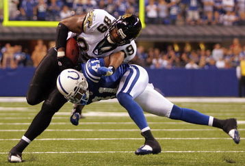 INDIANAPOLIS - SEPTEMBER 21:  Tight end Marcedes Lewis #89 of the Jacksonville Jaguars is tackled by Antoine Bethea #41 of the Indianapolis Colts on September 21, 2008 at Lucas Oil Stadium in Indianapolis, Indiana.  (Photo by Ronald Martinez/Getty Images)