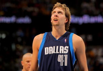 DENVER - MAY 03:  Dirk Nowitzki #41 of the Dallas Mavericks looks on against the Denver Nuggets in Game One of the Western Conference Semifinals during the 2009 NBA Playoffs at Pepsi Center on May 3, 2009 in Denver, Colorado. The Nuggets defeated the Mavericks 109-95. NOTE TO USER: User expressly acknowledges and agrees that, by downloading and or using this photograph, User is consenting to the terms and conditions of the Getty Images License Agreement.  (Photo by Doug Pensinger/Getty Images)
