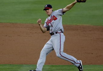 LOS ANGELES, CA - JULY 09:  Second baseman Kelly Johnson #2 of the Atlanta Bravesthrows to first against the Los Angeles Dodgers on July 9, 2008 at Dodger Stadiium in Los Angeles, California.   The Dodgers won 2-1.  (Photo by Stephen Dunn/Getty Images)