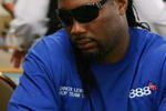 LAS VEGAS - JULY 31:  Retired boxing champion Lennox Lewis stacks his chips as he competes on the fourth day of the first round of the World Series of Poker no-limit Texas Hold 'em main event at the Rio Hotel & Casino July 31, 2006 in Las Vegas, Nevada. More than 8,700 players have registered to play in the main event. The final nine players will compete for the top prize of more than USD 11.7 million on the final table which begins August 10.  (Photo by Ethan Miller/Getty Images)