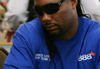 LAS VEGAS - JULY 31:  Retired boxing champion Lennox Lewis stacks his chips as he competes on the fourth day of the first round of the World Series of Poker no-limit Texas Hold 'em main event at the Rio Hotel & Casino July 31, 2006 in Las Vegas, Nevada. More than 8,700 players have registered to play in the main event. The final nine players will compete for the top prize of more than USD 11.7 million on the final table which begins August 10.  (Photo by Ethan Miller/Getty Images)
