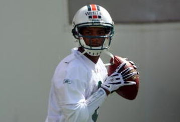 DAVIE, FL - MAY 02:  Rookie quarterback Pat White  #6 of the Miami Dolphins drops back to pass during mini camp on May 2, 2009 at the Miami Dolphins Training facility in Davie, Florida.  (Photo by Marc Serota/Getty Images)