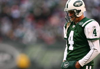EAST RUTHERFORD, NJ - DECEMBER 14:  Brett Favre #4 of The New York Jets walks on the field against The Buffalo Bills during their game on December 14, 2008 at Giants Stadium in East Rutherford, New Jersey.  (Photo by Al Bello/Getty Images)