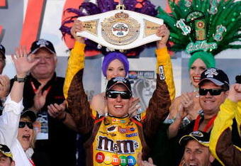 LAS VEGAS - MARCH 01:  Kyle Busch, driver of the #18 M&M's Toyota, celebrates in victory lane after winning the NASCAR Sprint Cup Series Shelby 427 at the Las Vegas Motor Speedway on March 1, 2009 in Las Vegas, Nevada.  (Photo by Rusty Jarrett/Getty Images for NASCAR)