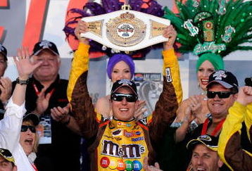 LAS VEGAS - MARCH 01:  Kyle Busch, driver of the #18 M&M's Toyota, celebrates in victory lane after winning the NASCAR Sprint Cup Series Shelby 427 at the Las Vegas Motor Speedway on March 1, 2009 in Las Vegas, Nevada.  (Photo by Rusty Jarrett/Getty Images for NASCAR)