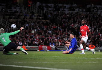LONDON, ENGLAND - MAY 05:  Cristiano Ronaldo of Manchester United shoots and scores the third goal of the game during the UEFA Champions League Semi Final Second Leg match between Arsenal and Manchester United at Emirates Stadium on May 5, 2009 in London, England.  (Photo by Shaun Botterill/Getty Images)