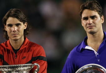 MELBOURNE, AUSTRALIA - FEBRUARY 01:  Roger Federer (R) of Switzerland and Rafael Nadal of Spain pose with their trophies after the men's final match during day fourteen of the 2009 Australian Open at Melbourne Park on  February 1, 2009 in Melbourne, Australia.  (Photo by Lucas Dawson/Getty Images)