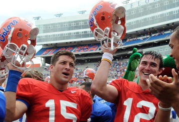 GAINESVILLE, FL - APRIL 18: Quarterbacks Tim Tebow #15 and John Brantley #12 of the University of Florida celebrate after the spring football orange and blue game April 18, 2009 at Ben Hill Griffin Stadium in Gainesville, Florida.  (Photo by Al Messerschmidt/Getty Images)