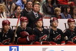 GLENDALE, AZ - APRIL 11:  Head coach Wayne Gretzky of the Phoenix Coyotes looks on with teammates on the bench during the NHL game against the Anaheim Ducks at Jobing.com Arena on April 11, 2009 in Glendale, Arizona. The Coyotes defeated the Ducks in 5-4 in an overtime shootout. (Photo by Christian Petersen/Getty Images)