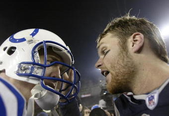 FOXBORO, MA - JANUARY 18:   Quarterback Tom Brady #12 of the New England Patriots speaks with Quarterback Peyton Manning #18 of the Indianapolis Colts after the  AFC Championship Game on January 18, 2004 at Gillette Stadium in Foxboro, Massachusetts. The Patriots defeated the Colts 24-14. (Photo by Elsa/Getty Images)
