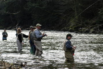 VOLANT, PA - APRIL 17:  Anglers line up in a section of the Neshannock Creek April 17, 2004 near Volant, Pennsylvania. Thousands of anglers across Pennsylvania cast their lines on Saturday, the first day of trout fishing season.  (Photo by Mark Stahl/Getty Images)