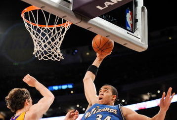 LOS ANGELES, CA - JANUARY 22: JaVale McGee #34 of the Washington Wizards slams the ball against Pau Gasol of the Los Angeles Lakers during the second quarter at the Staples Center January 22, 2009 in Los Angeles, California. NOTE TO USER: User expressly acknowledges and agrees that, by downloading and/or using this Photograph, user is consenting to the terms and conditions of the Getty Images License Agreement.  (Photo by Kevork Djansezian/Getty Images)