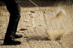 PONTE VEDRA BEACH, FL - MAY 06:  A golfer plays a shot from a bunker during a practice round prior to the start of THE PLAYERS Championship on THE PLAYERS Stadium Course at TPC Sawgrass on May 6, 2009 in Ponte Vedra Beach, Florida.  (Photo by Sam Greenwood/Getty Images)
