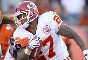 CINCINNATI - DECEMBER 28: Larry Johnson #27 of the Kansas City Chiefscarries the ball as he breaks a tackle during the NFL game against the Cincinnati Bengals on December 28, 2008 at Paul Brown Stadium in Cincinnati, Ohio.  (Photo by Andy Lyons/Getty Images)