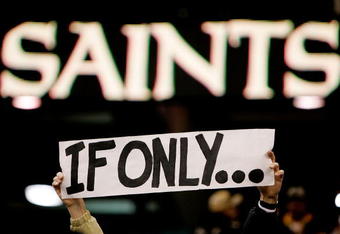 NEW ORLEANS - DECEMBER 23:  A fan holds up a sign after the New Orleans Saints were defeated by the Philadelphia Eagles 38-23 at the Louisiana Superdome on December 23, 2007 in New Orleans, Louisiana.  (Photo by Chris Graythen/Getty Images)