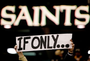 NEW ORLEANS - DECEMBER 23:  A fan holds up a sign after the New Orleans Saints were defeated by the Philadelphia Eagles 38-23 at the Louisiana Superdome on December 23, 2007 in New Orleans, Louisiana.  (Photo by Chris Graythen/Getty Images)