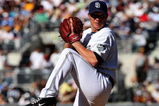 SAN DIEGO - APRIL 06:  Pitcher Jake Peavy #44 of the San Diego Padres throws a pitch against the Los Angeles Dodgers on April 6, 2009 at Petco Park in San Diego, California.  The Dodgers won 4-1.  (Photo by Stephen Dunn/Getty Images)