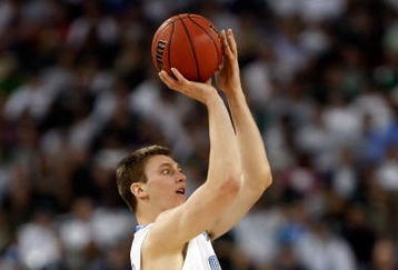 DETROIT - APRIL 06:  Tyler Hansbrough #50 of the North Carolina Tar Heels goes up for a shot over Goran Suton #14 of the Michigan State Spartans in the first half during the 2009 NCAA Division I Men's Basketball National Championship game at Ford Field on April 6, 2009 in Detroit, Michigan.  (Photo by Streeter Lecka/Getty Images)