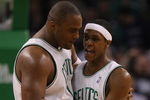 BOSTON - FEBRUARY 10:  Rajon Rondo #9 of the Boston Celtics congratulates teammate Glen Davis #11 after Davis made the basket and drew the foul in the second half against San Antonio Spurs on February 10, 2008 at the TD Banknorth Garden in Boston, Massachusetts. The Boston Celtics defeated the San Antonio Spurs 98-90. NOTE TO USER: User expressly acknowledges and agrees that, by downloading and or using this Photograph, user is consenting to the terms and conditions of the Getty Images License Agreement.  (Photo by Elsa/Getty Images)