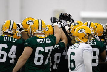 GREEN BAY, WI - MAY 1:  Green Bay Packers players huddle as a team as they participate in practice drills during Green Bay Packers Minicamp at Don Hutson Center on May 1, 2009 in Green Bay, Wisconsin. (Photo by Scott Boehm/Getty Images)