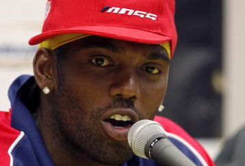 SPARTA, KY - JULY 19:  Randy Moss, owner of the #81 Rascal Flatts Chevrolet truck addresses the media at press conference before the NASCAR Craftsman Truck Series Built Ford Tough 225 at the Kentucky Speedway on July 19, 2008 in Sparta, Kentucky.  (Photo by John Sommers II/Getty Images)