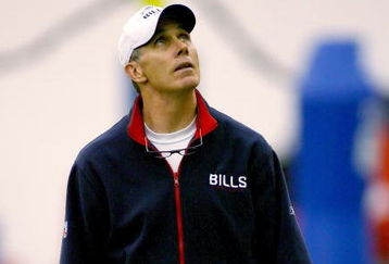 ORCHARD PARK, NY - MAY 01: Dick Jauron, head coach of the Buffalo Bills looks up to a video basket during Buffalo Bills Minicamp at Buffalo Bills Fieldhouse on May 1, 2009 in Orchard Park, New York.  (Photo by Rick Stewart/Getty Images)