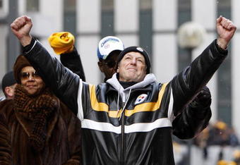 PITTSBURGH - FEBRUARY 03: Defensive Coordinator Dick LeBeau of the Pittsburgh Steelers pumps his fists during a parade to celebrate winning Super Bowl XLIII on February 3, 2009 in Pittsburgh, Pennsylvania.  (Photo by Gregory Shamus/Getty Images)