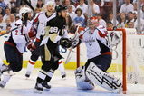 PITTSBURGH - MAY 06:  Goaltender Simeon Varlamov #40 of the Washington Capitals attempts to make a save as Tyler Kennedy #48 of the Pittsburgh Penguins moves in for the rebound during Game Three of the Eastern Conference Semifinal Round of the 2009 Stanley Cup Playoffs at Mellon Arena on May 6, 2009 in Pittsburgh, Pennsylvania.  (Photo by Jamie Sabau/Getty Images)