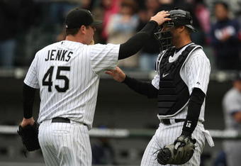 CHICAGO - APRIL 29:  Bobby Jenks #45 of the Chicago White Sox congratulates teammate A.J. Pierzynski #12 after a win against the Seattle Mariners on April 29, 2009 at U.S. Cellular Field in Chicago, Illinois. The White Sox defeated the Mariners 6-3. (Photo by Jonathan Daniel/Getty Images)
