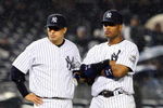 NEW YORK - MAY 05:  Ramiro Pena #19 and Robinson Cano #24 of the New York Yankees looks on against the Boston Red Sox on May 5, 2009 at Yankee Stadium in the Bronx borough of New York City.  (Photo by Jim McIsaac/Getty Images)