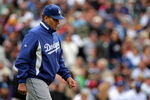 DENVER - APRIL 26:  Manager Joe Torre #6 of the Los Angeles Dodgers heads to the mound to remove starting pitcher Clayton Kershaw in the fifth inning against the Colorado Rockies at Coors Field on April 26, 2009 in Denver, Colorado. The Rockies and defeated Dodgers 10-4.  (Photo by Doug Pensinger/Getty Images)