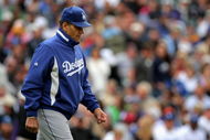 DENVER - APRIL 26:  Manager Joe Torre #6 of the Los Angeles Dodgers heads to the mound to remove starting pitcher Clayton Kershaw in the fifth inning against the Colorado Rockies at Coors Field on April 26, 2009 in Denver, Colorado. The Rockies and defeated Dodgers 10-4.  (Photo by Doug Pensinger/Getty Images)