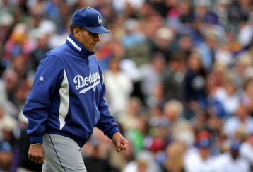 DENVER - APRIL 26:  Manager Joe Torre #6 of the Los Angeles Dodgers heads to the mound to remove starting pitcher Clayton Kershaw in the fifth inning against the Colorado Rockies at Coors Field on April 26, 2009 in Denver, Colorado. The Rockies and defeated Dodgers 10-4.  (Photo by Doug Pensinger/Getty Images)