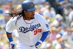 LOS ANGELES, CA - APRIL 19:  Manny Ramirez #99 of the Los Angeles Dodgers runs to first against the Colorado Rockies during the game at Dodger Stadium on April 19, 2009 in Los Angeles, California.  (Photo by Harry How/Getty Images)