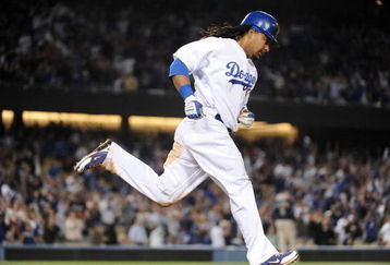 LOS ANGELES, CA - APRIL 30:  Manny Ramirez #99 of the Los Angeles Dodgers hits a homerun for a 4-3 lead against the San Diego Padres during the third inning at Dodger Stadium on April 30, 2009 in Los Angeles, California.  (Photo by Harry How/Getty Images)