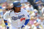 LOS ANGELES, CA - APRIL 19:  Manny Ramirez #99 of the Los Angeles Dodgers runs to first against the Colorado Rockies during the game at Dodger Stadium on April 19, 2009 in Los Angeles, California.  (Photo by Harry How/Getty Images)